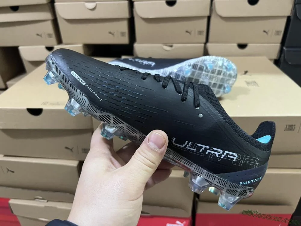 Upgrade Your Game with Black, White and Blue FG Soccer Cleats